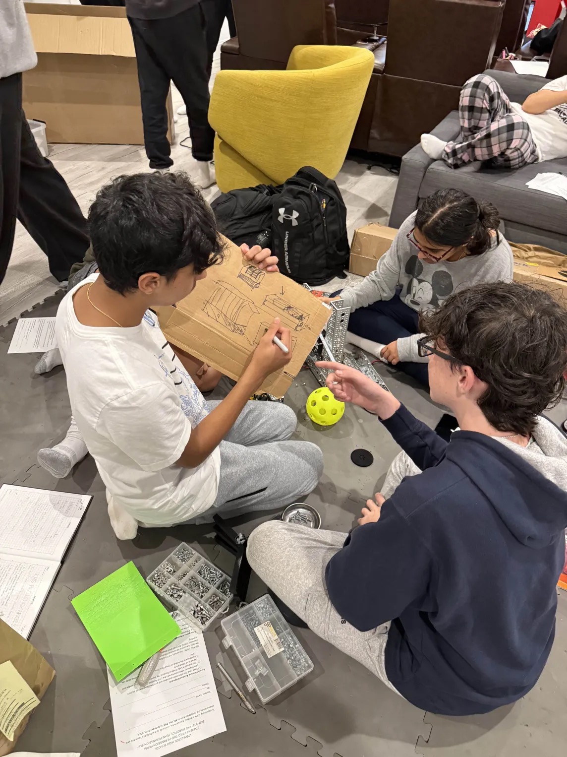 Team sketching and prototyping a mechanism